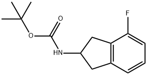 Carbamic acid, N-(4-fluoro-2,3-dihydro-1H-inden-2-yl)-, 1,1-dimethylethyl ester Struktur