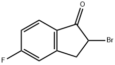 2-BROMO-2,3-DIHYDRO-5-FLUORO-1H-INDEN-1-ONE Struktur