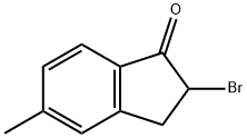 2-BROMO-2,3-DIHYDRO-5-METHYL-1H-INDEN-1-ONE Struktur