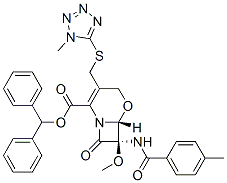 (6R,7R)-7-Methoxy-3-[(1-methyl-1H-tetrazol-5-ylthio)methyl]-8-oxo-7-(p-toluoylamino)-5-oxa-1-azabicyclo[4.2.0]oct-2-ene-2-carboxylic acid diphenylmethyl ester Struktur